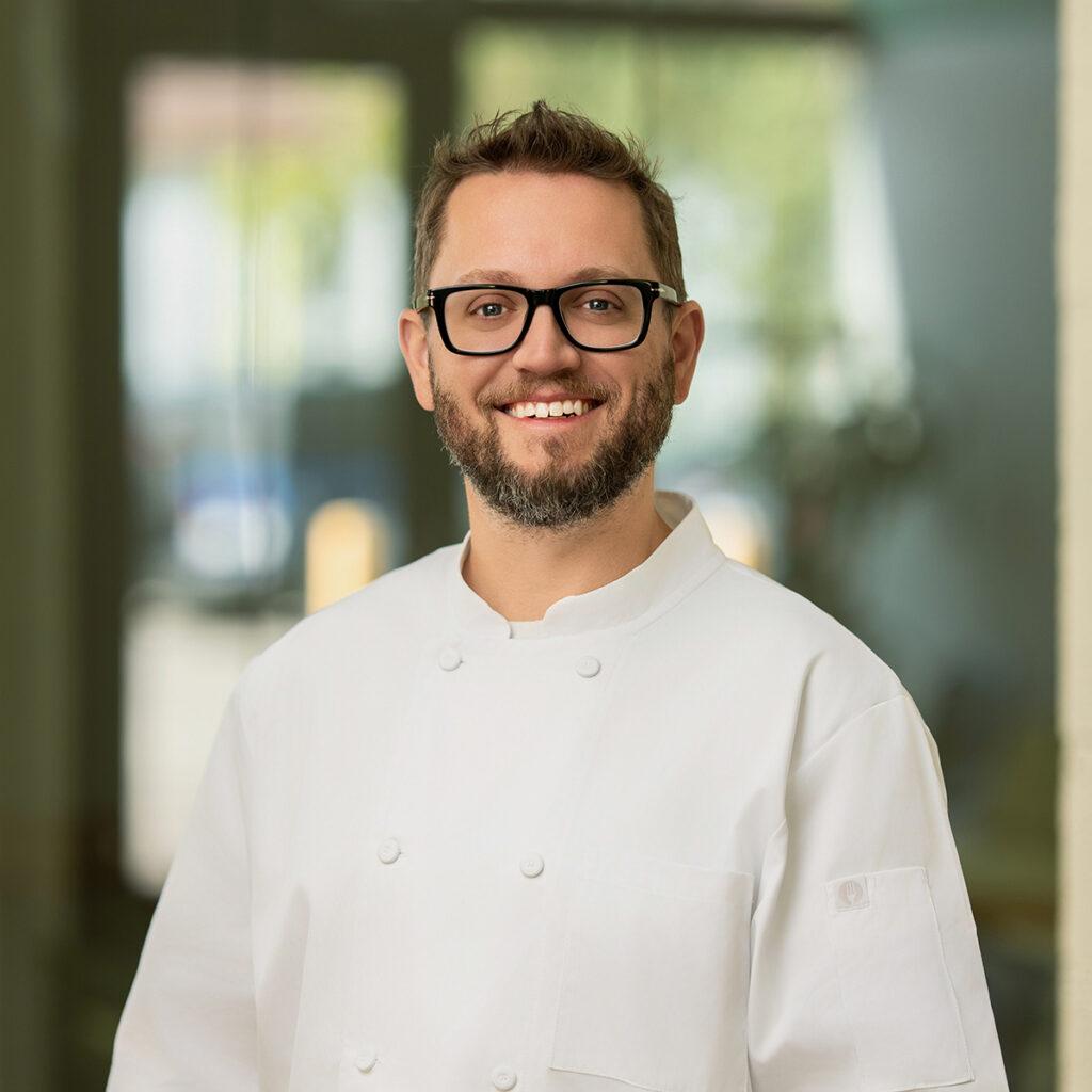 Portrait of Geoff Cox, Chef at Cimera restaurant in The Source.